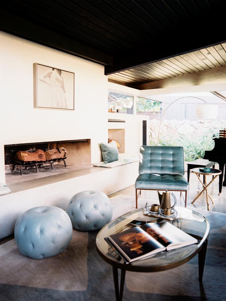 Modern Living Room With Fireplace and Blue Furniture   