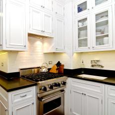 White Kitchen With Black Countertops