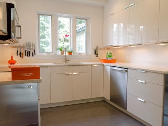 Modern Kitchen With Orange Accessories