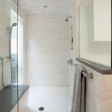 Contemporary Shower With Creamy Marble Tile