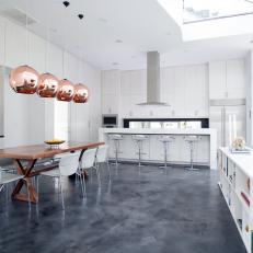Modern Open-Plan Kitchen with Stained Concrete Floor