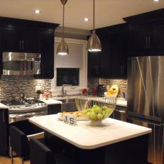 Modern Black And White Kitchen With Stainless Steel Appliances