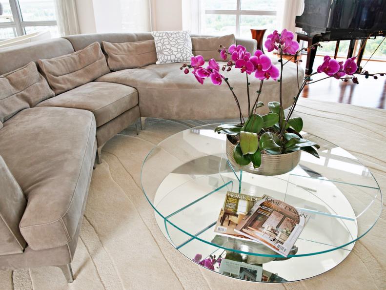 Contemporary Living Room With Round Glass Coffee Table 