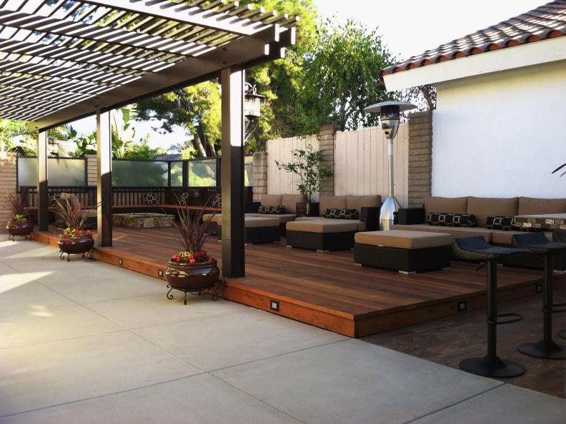 Redwood Deck With Pergola and Brown Benches With Ottomans