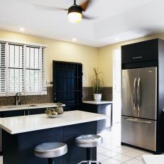 Contemporary Black and White Kitchen With Yellow Walls 