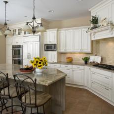 Spacious Kitchen With Granite Topped Island 