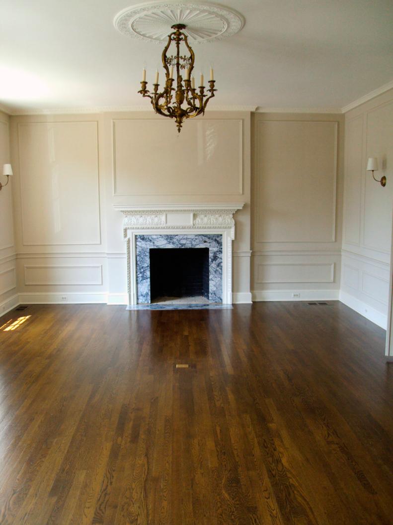 The 1923 Georgian Revival living room features beautiful architecture that the homeowners want to highlight, as well as create a comfy, modern space for entertaining. 