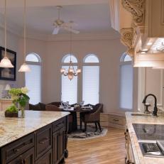 Old World Kitchen Island and Dining Area 