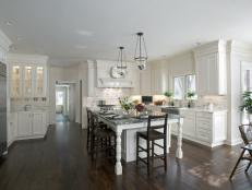 White Cottage Eat-In Kitchen With Glass Pendants