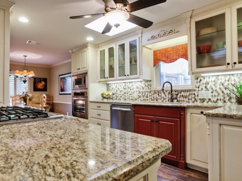White Cabinets and Gray Granite Countertops in a Traditional Kitchen