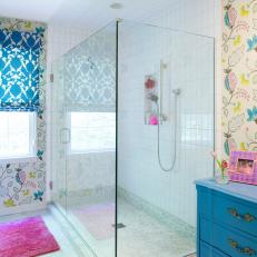 Colorful Feminine Bathroom With Glass-Enclosed Shower
