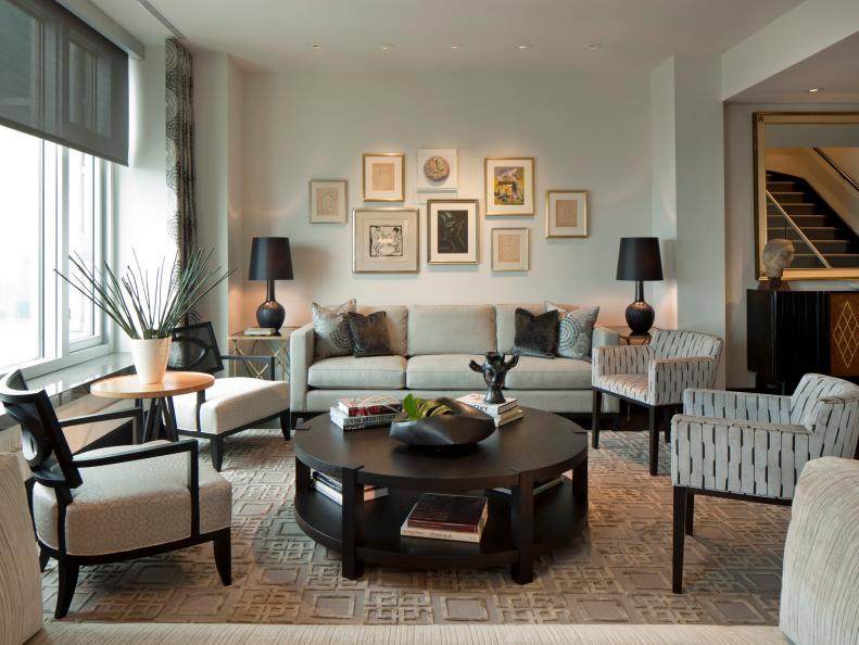 Living Room With Gallery Wall, Contemporary Gray Chairs and Round Table