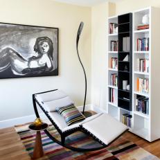 Modern Yellow Sitting Area With Bookshelves