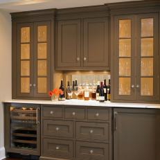Brown Kitchen Cabinetry with Wine Storage