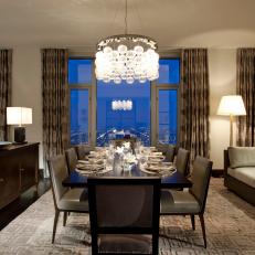 Penthouse Dining Room With Modern Crystal Chandelier