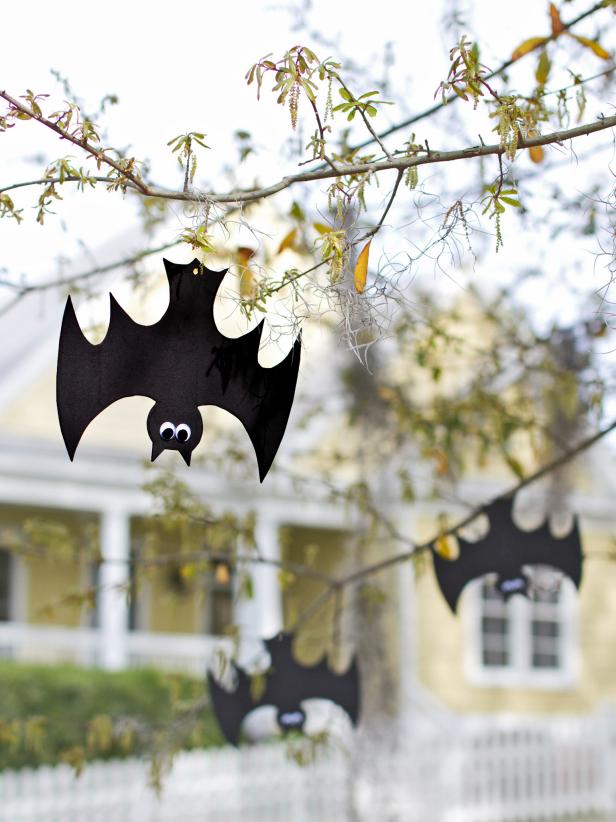 Black craft foam, googly eyes and fishing line are all you need to create a whole colony of swooping, weatherproof bats.
