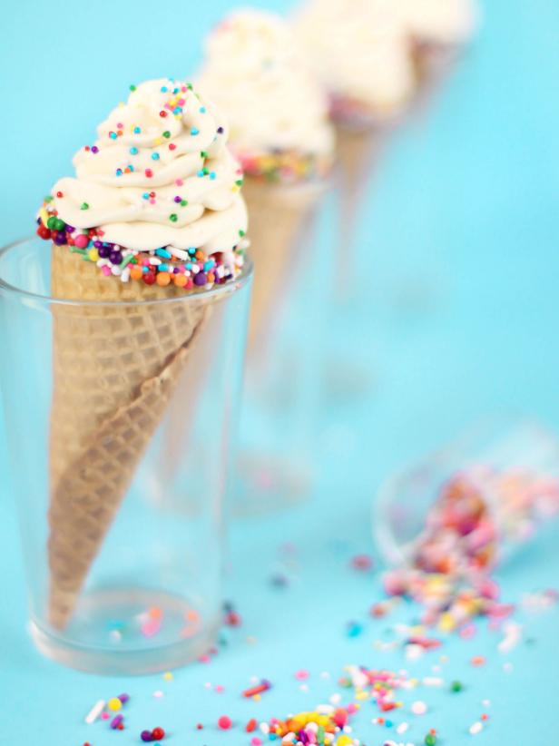 Sprinkle your finished cheesecake cones with multicolor nonpariels and refrigerate until ready to serve, or you could freeze them for an extra frosty treat.