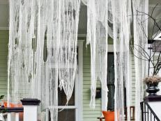Tattered Cheesecloth Drapes on Halloween Porch