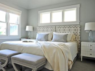 Gray Bedroom With Graphic Headboard, X-Base Stools At End of Bed