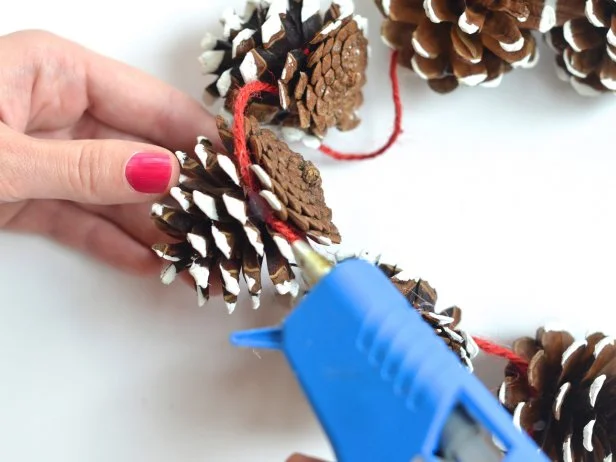 Secure any loose bits of yarn with a bit of hot glue.