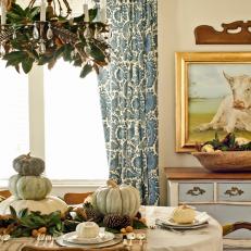 Rustic Fall Table Setting With Decorated Chandelier