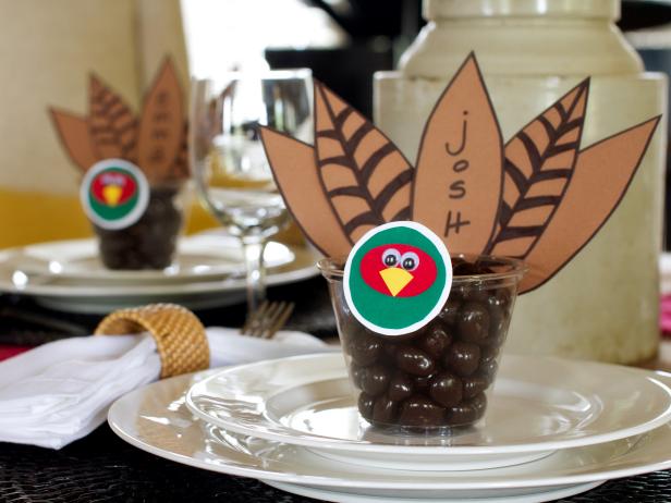 Kids will have as much fun crafting these cute place cards as they will devouring their sweet contents. Our <a href=&quot;http://hgtv.sndimg.com/HGTV/2013/09/11/original_Thanksgiving-place-card-party-favor.pdf&quot;>free printable template</a> makes assembly a snap. Ready to make your own? <a href=&quot;http://www.hgtv.com/handmade/thanksgiving-place-card-and-party-favor/index.html&quot;>Get step-by-step instructions.</a>