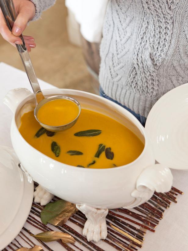 Curried Butternut Squash Soup in Serving Bowl With Ladle 