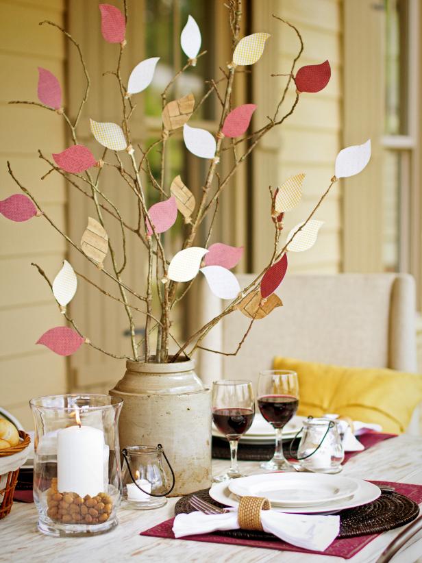 Get a little help from the kiddos to craft this easy focal point. Use our free template to cut leaf shapes from colorful card stock you can attach to bare branches gathered in the backyard. Before dinner, ask your guests to write what they're most thankful for on the leaves or just leave them blank. Get crafting with our step-by-step instructions.