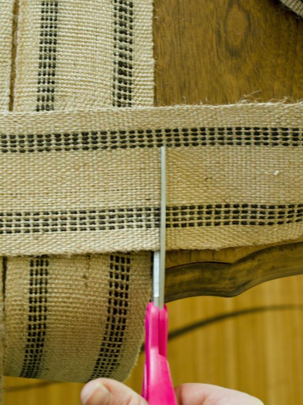 Cut length pieces first, then move to the width pieces. Line up all lengths of upholstery webbing. Run another piece of webbing across length and cut to size with sharp scissors — no excess overhang is necessary. Repeat this process until entire width of runner is covered