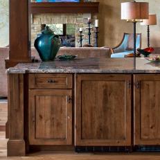 Rustic Wood Cabinets With Green Ceramic Pot