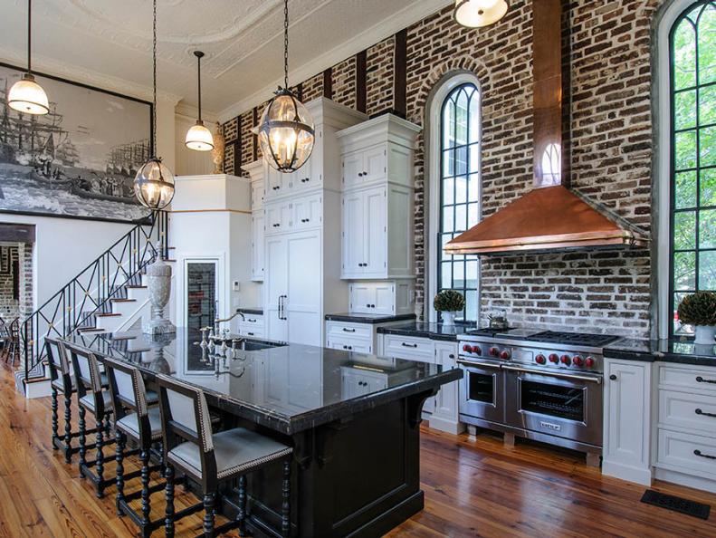 Open-Plan Neutral Transitional Kitchen With Exposed Brick Wall