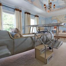 Travel-Inspired Kids' Bedroom With Airplane Bed