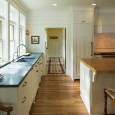 White Kitchen With Hardwood Floors