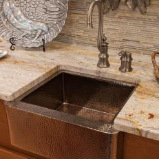 Rustic Copper Farmhouse Sink and Tile Backsplash