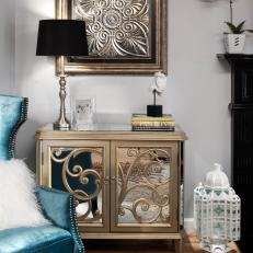 Mirrored Side Table With Metallic Lamp