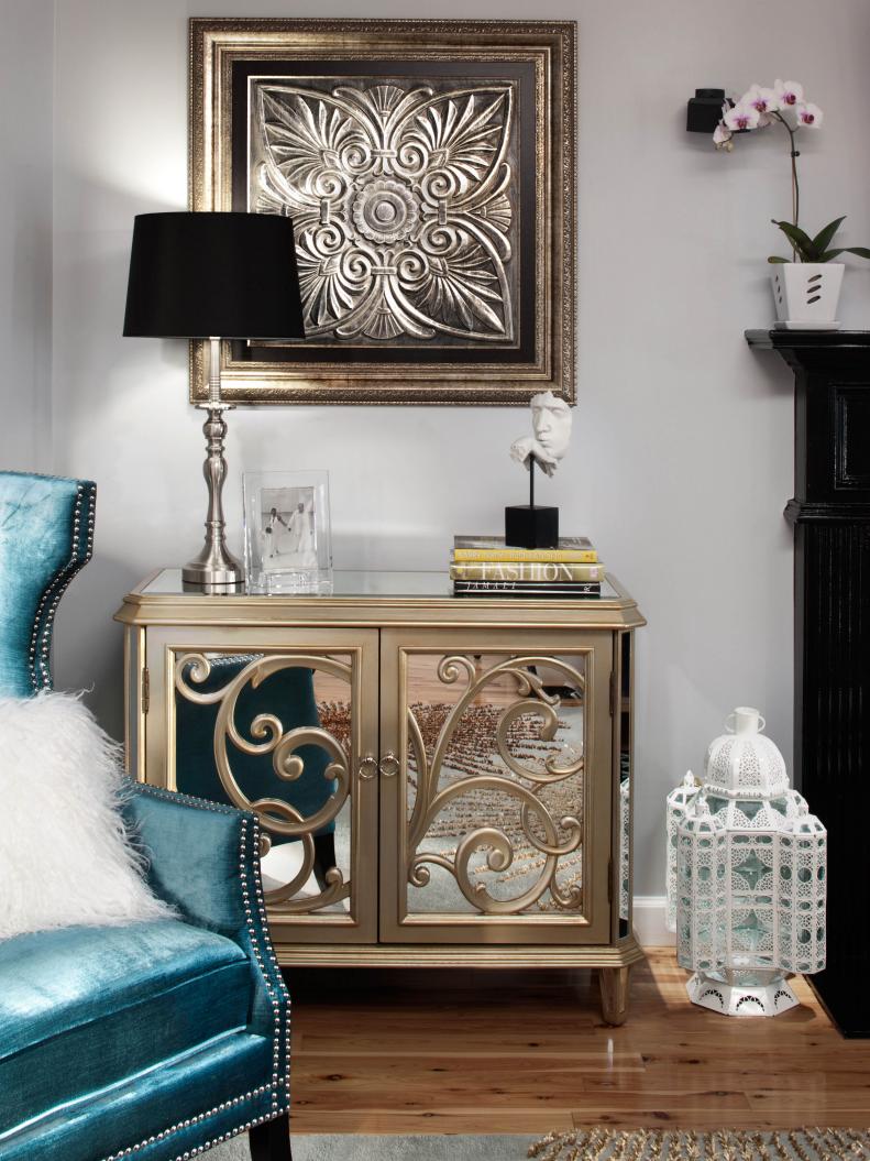 Neutral Sitting Room With Mirrored Side Table, Silver Lamp, Orchid