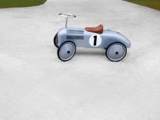 Silver Toy Car in Driveway