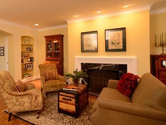 sitting room with trunk, traditional furniture and marble fireplace