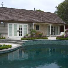 Traditional Cottage Exterior With Pool