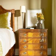 Traditional Bedroom With Unique Wood Nightstand
