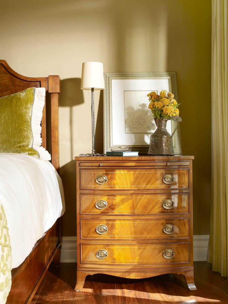 Wood Nightstand With Yellow Coloring in Traditional Neutral Bedroom