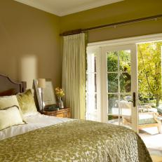 Traditional Yellow Bedroom With French Doors