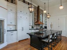 Traditional White Eat-In Kitchen with Brick Wall and Copper Range Hood
