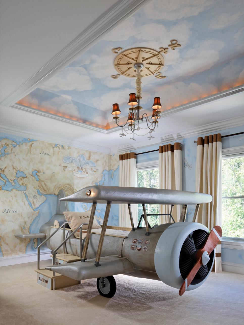 Kid's Bedroom With Airplane-Shaped Bed, Map Mural and Tray Ceiling