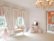 Ornate pink bedroom with Victorian pieces perfect for a ballerina