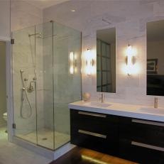 Modern Bathroom With Marble Wall and Glass Shower