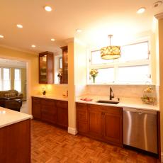 Transitional Kitchen With Wood Cabinets and Parquet Floors