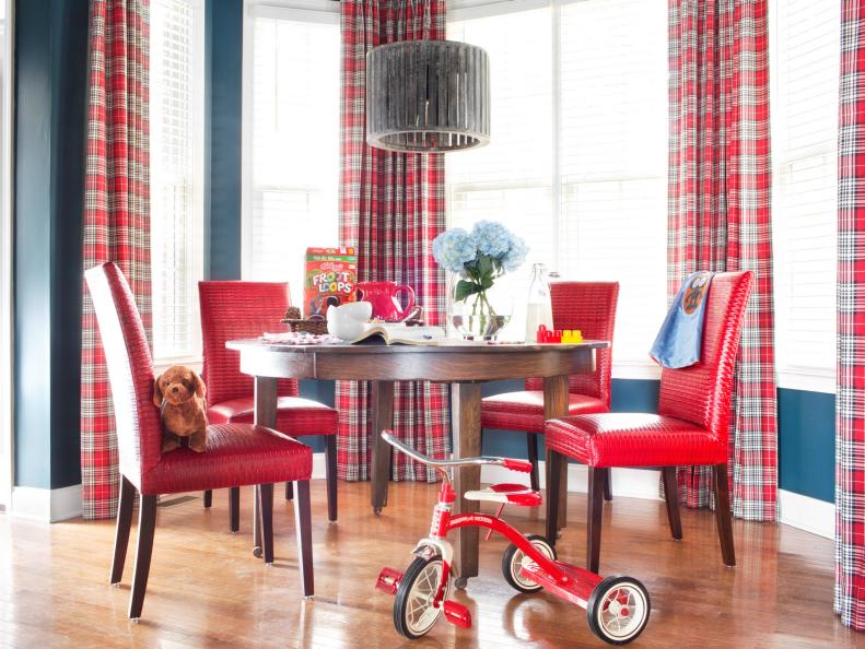 Eclectic, Red Dining Room With Round Table and Red Parsons Chairs
