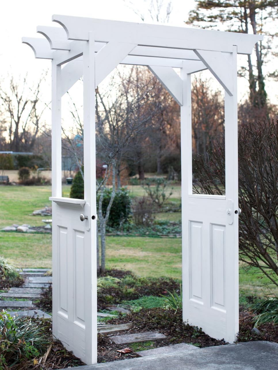 White Arbor Built from Repurposed Doors | HGTV