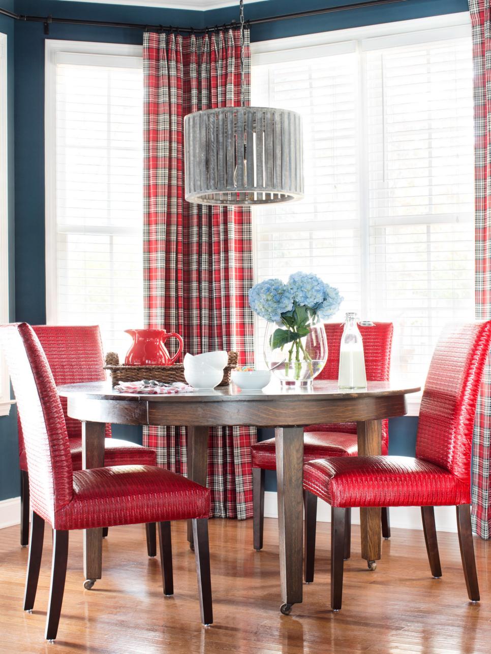 Navy Breakfast Nook With Red Dining Chairs And Plaid Drapes Hgtv